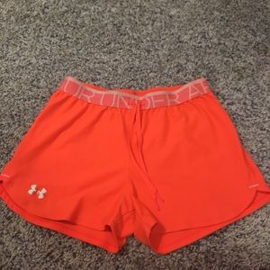 I am selling bright orange under armour shorts